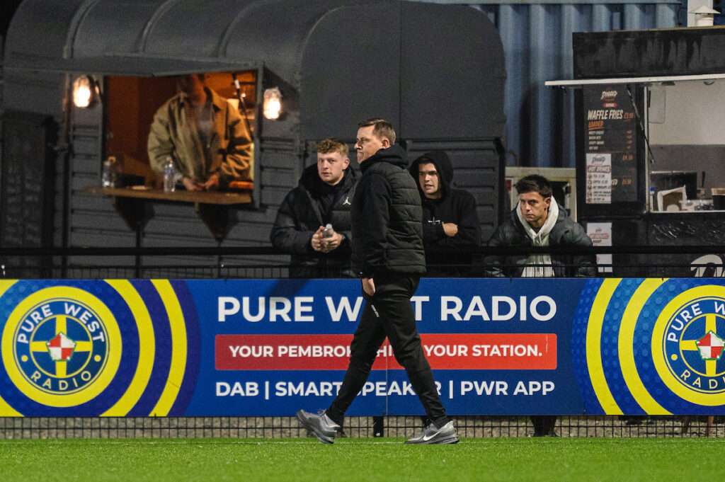 Haverfordwest County Manager Tony Pennock is sent off during the Novira Cymru Premier 2026/27 fixture Haverfordwest County vs Caernarfon Town at Dynamite Bridge Meadow Stadium, Haverfordwest, Wales