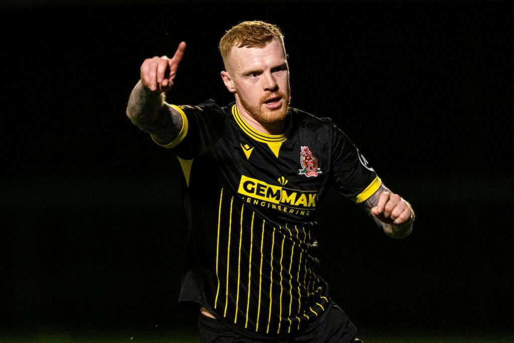 Tom Walters of Briton Ferry Llansawel celebrates scoring his sides first goal during the 2025/26 JD Cymru Premier match between Cardiff Met & Briton Ferry Llansawel at the Cyncoed Campus, Cardiff, Wales. 