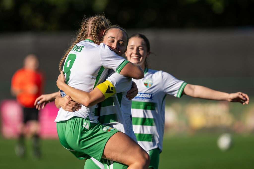 TNS Womens' Caitlin Chapman and TNS Womens' Annie Davies celebrate at the final whistle of the Genero Adran Premier game between The New Saints and Swansea City at the Park Hall Stadium in Oswestry