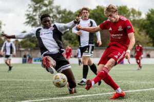 Mikey Stone of Connah's Quay Nomads during the 2026-27 Novira Cymru Premier match between Flint Town United and Connah's Quay Nomads at Flint, Essity Stadium, Wales