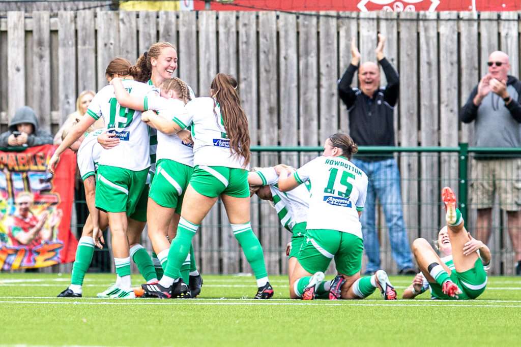 Fiona Barry of The New Saints celebrates as she makes it 3-2 during the 2026-27 Genero Adran Premier match between Wrexham and The New Saints at The Rock, Wrexham, Wales