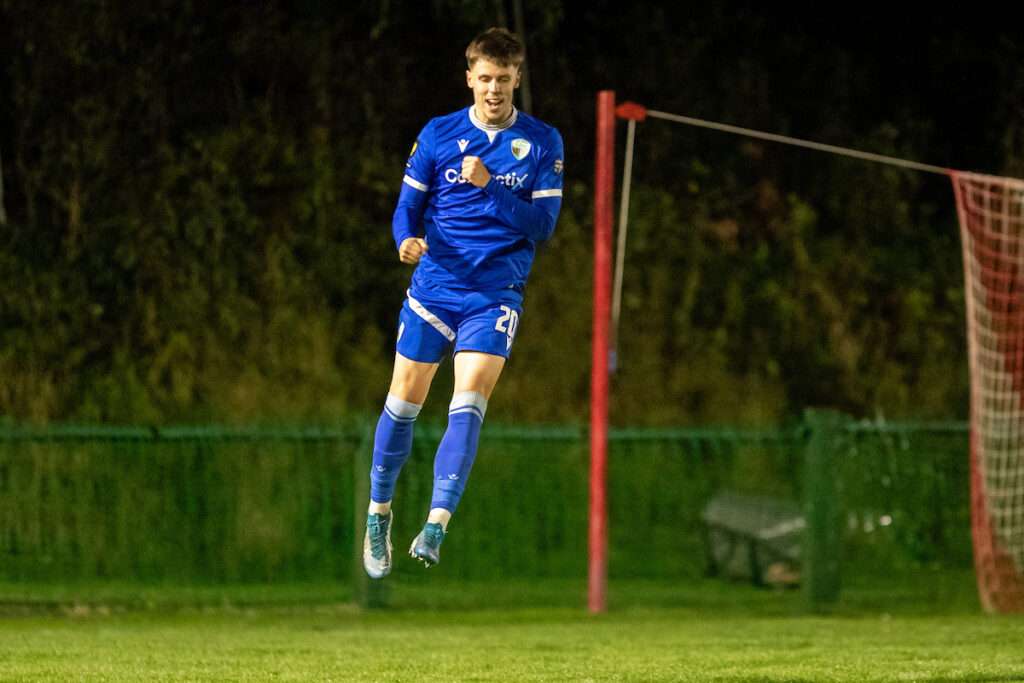 Rhys Hughes of The New Saints restores the away side’s advantage early in the second half during the 2026-27 Novira Cymru Premier match between Holywell Town and The New Saints at Halkyn Road, Holywell, Wales
