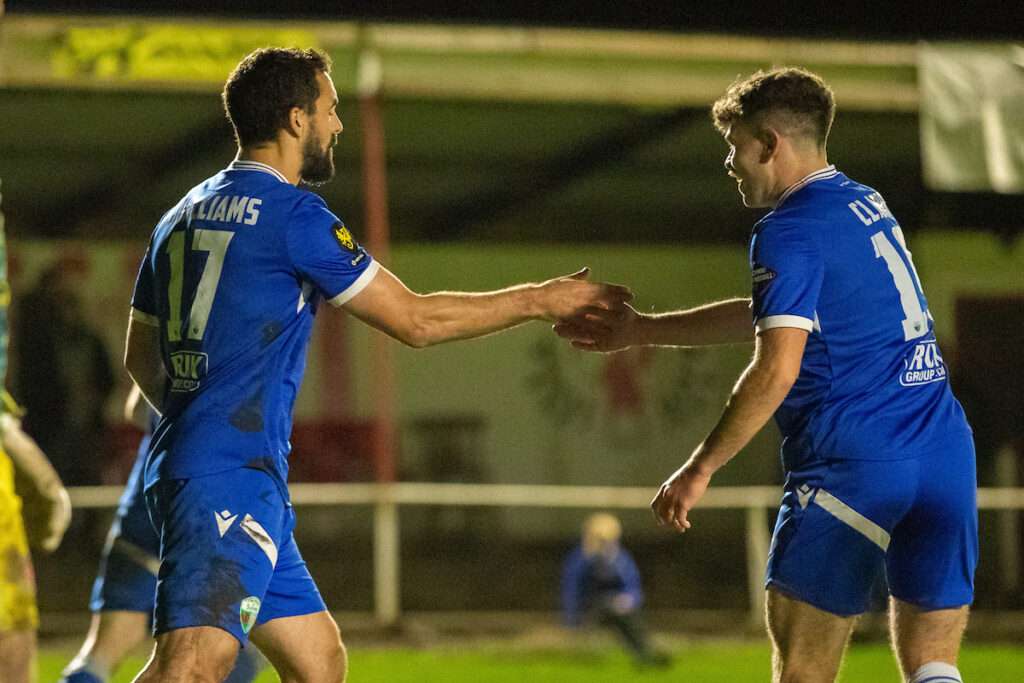 Jordan Williams of The New Saints makes it 6-1 from the penalty spot during the 2026-27 Novira Cymru Premier match between Holywell Town and The New Saints at Halkyn Road, Holywell, Wales