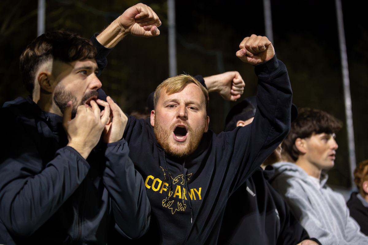 Caernarfon Town fans celebrate Sion Bradley’s penalty during the FAW Welsh Cup match between Flint Town United and Caernarfon Town at Essity Stadium, Flint, Wales