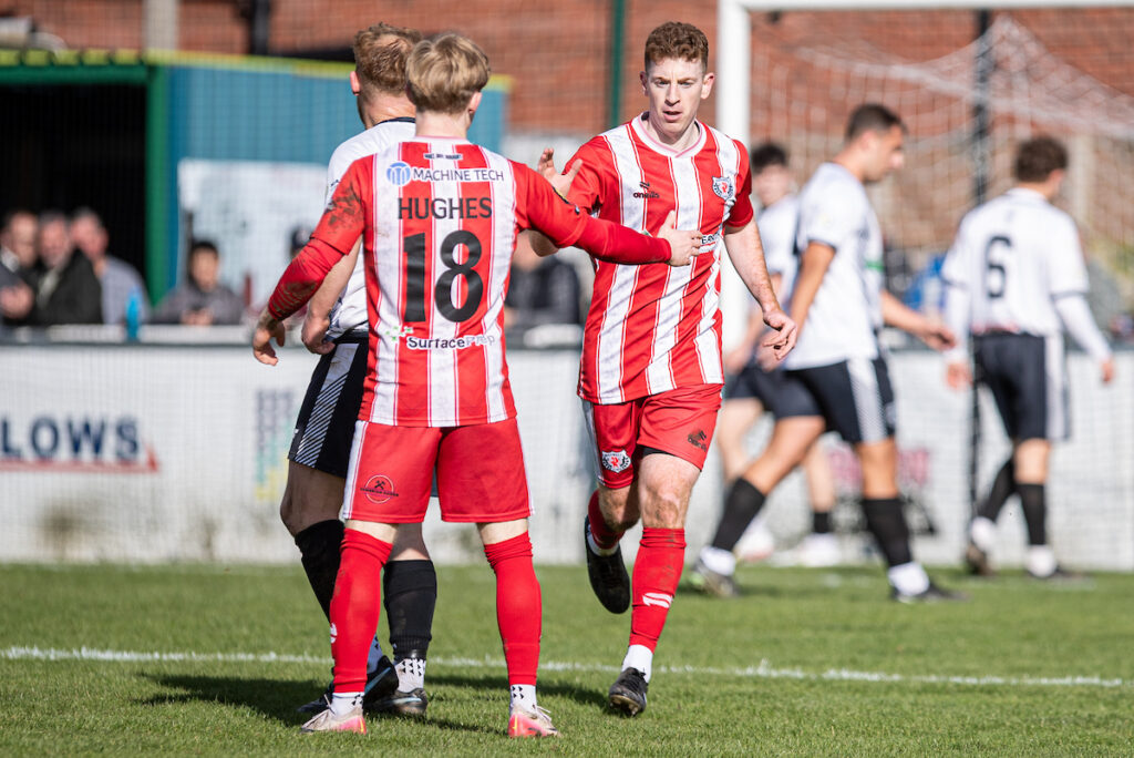 Holywell Town's Dominic McGiveron celebrates his equalising goal during the FAW Welsh Cup match between Llay Welfare and Holywell Town at Llay Welfare, Llay, Wales.