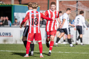 Holywell Town's Dominic McGiveron celebrates his equalising goal during the FAW Welsh Cup match between Llay Welfare and Holywell Town at Llay Welfare, Llay, Wales.