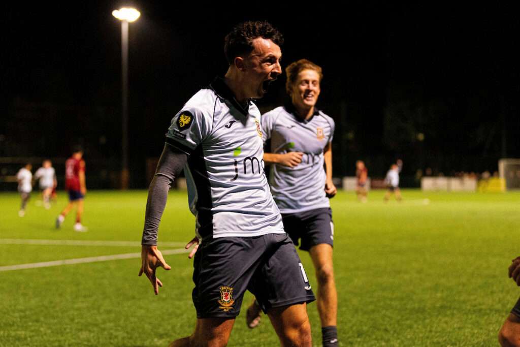 Roan Piper of Trefelin celebrates scoring his teams third goal during the 2026/27 Novira Cymru Premier fixture between Cardiff Met & Trefelin at the Cyncoed Stadium, Cardiff, Wales