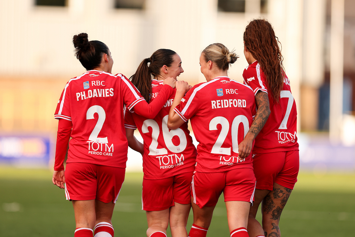 Wrexham's Maria Francis-Jones celebrates scoring her sides third goal in the Genero Adran Premier 26/27 fixture between Barry Town United Women and Wrexham