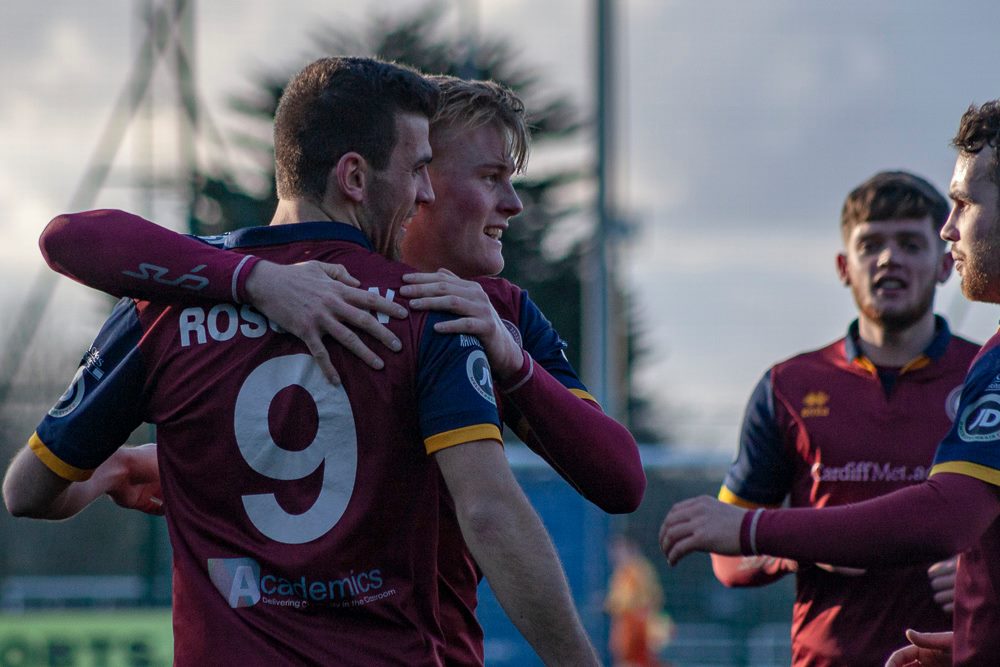 Adam Roscrow celebrates with Cardiff Met teammate Will Evans