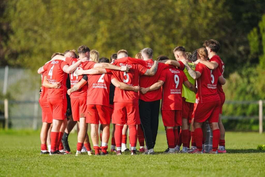 Llangennech AFC in a huddle