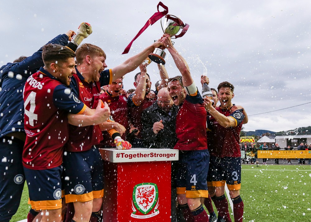 Cardiff Met players celebrate beating Bala Town in the European Play-Off final