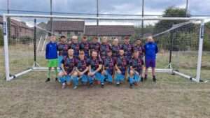 Blaen-y-maes in their warm-up tops