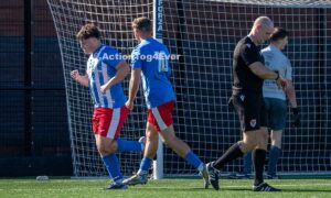 Callum Bridge celebrates after scoring a penalty for Cardiff Cosmopolitan against Afan United in the FAW Amateur Trophy