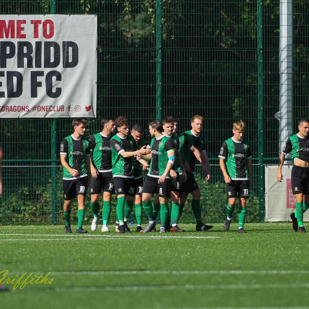 Aberystwyth Town celebrates Liam Angel's own goal against Pontypridd United in a Cymru South clash