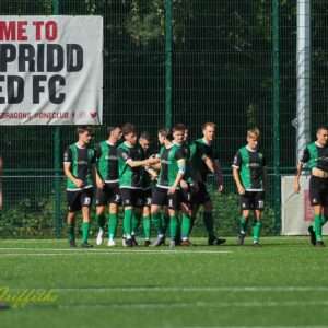 Aberystwyth Town celebrates Liam Angel's own goal against Pontypridd United in a Cymru South clash