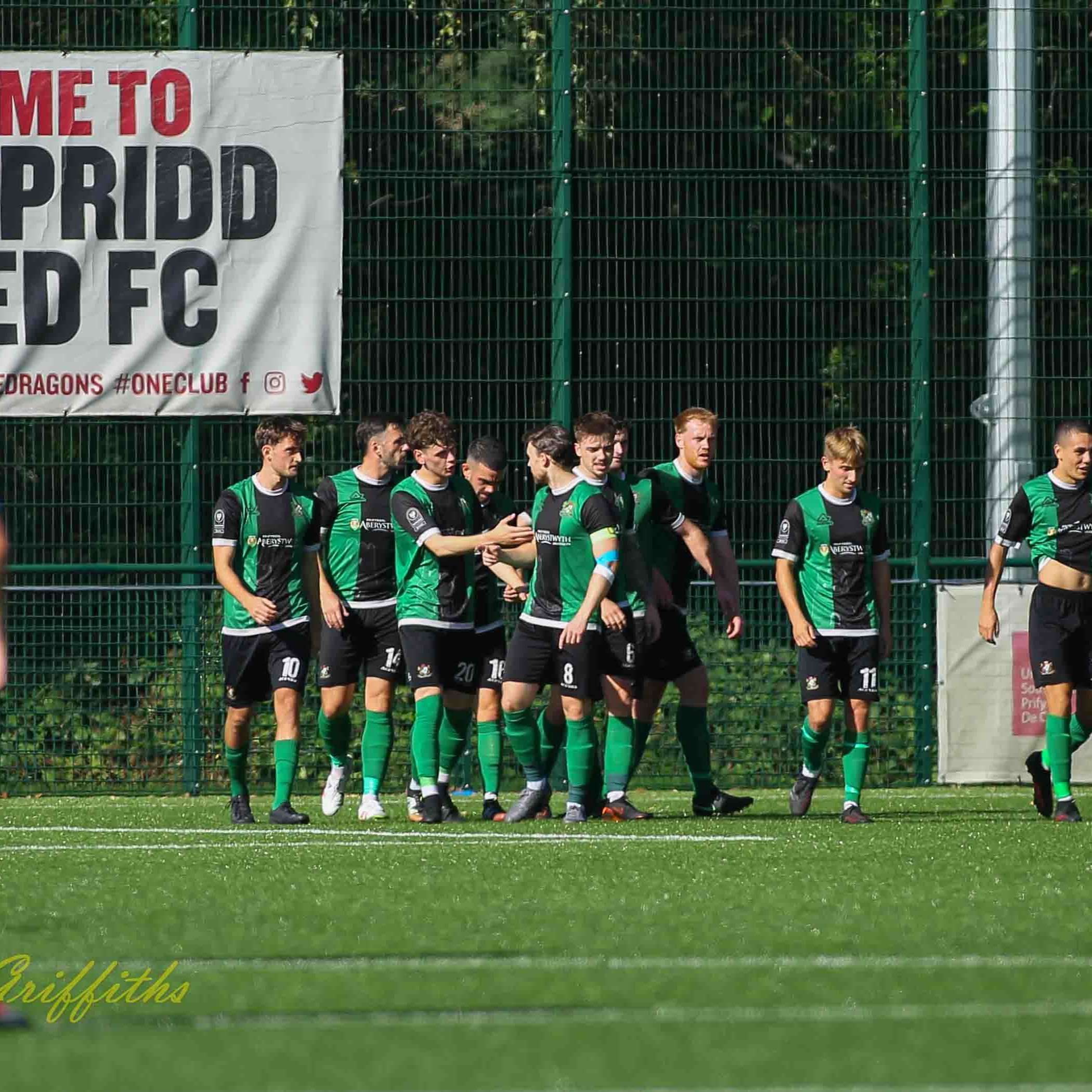 Aberystwyth Town celebrates Liam Angel's own goal against Pontypridd United in a Cymru South clash