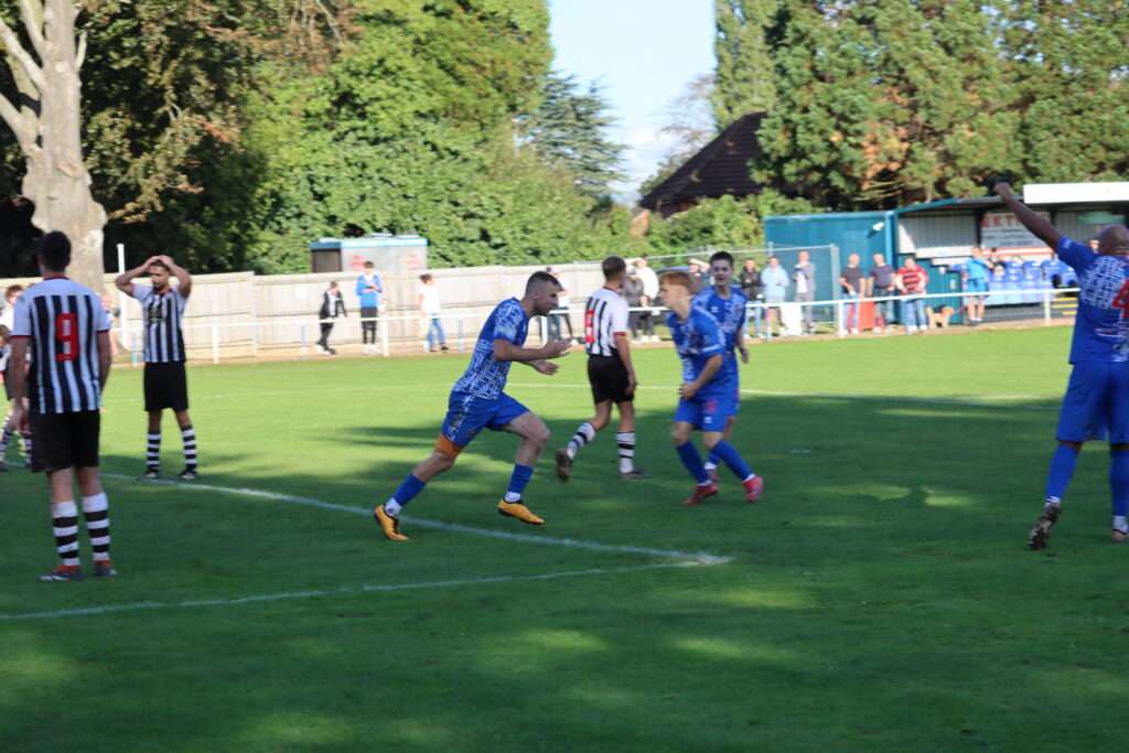 Chris Ham celebrates scoring a goal for Chepstow Town in the Ardal South East
