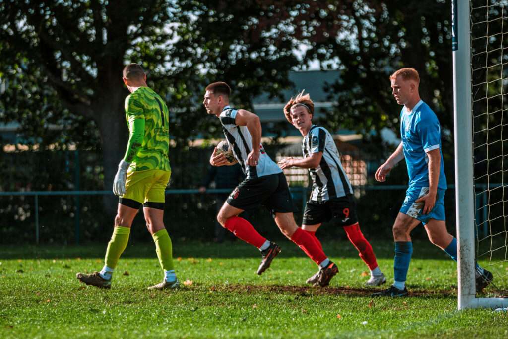 Cam Egan celebrates as he scores for Cardiff Dracs against Carmarthen Town in the Cymru South