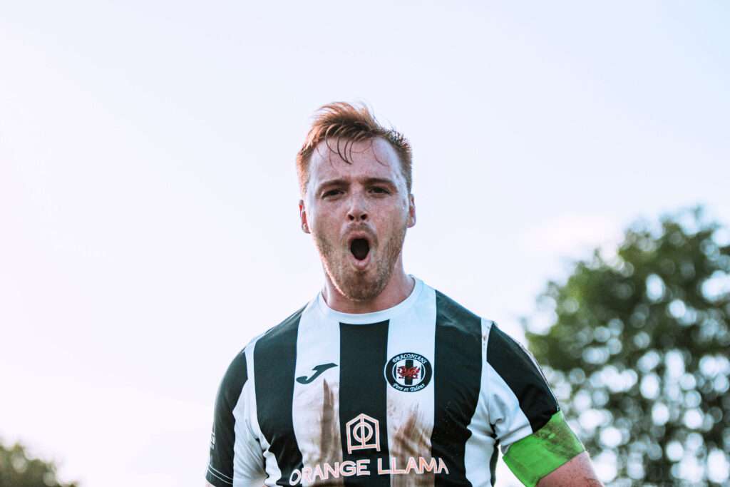 Sam Cawley celebrates his equaliser for Cardiff Dracs against Carmarthen Town in the Cymru South