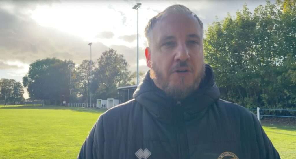 Chepstow Town manager Marc Ingles conducts a post-match interview after beating Caldicot Town in the Ardal South East