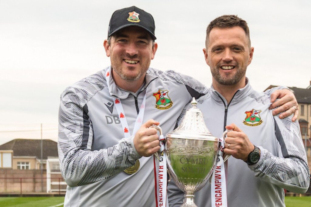 Llanelli Town's Dylan Blain and Lee John with the Cymru South title