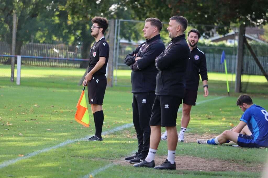 Paul Parry (L) on the touchline for Chepstow Town against Caldicot Town