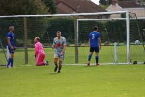 Chris Ham celebrates his goal for Chepstow Town against Caldicot Town